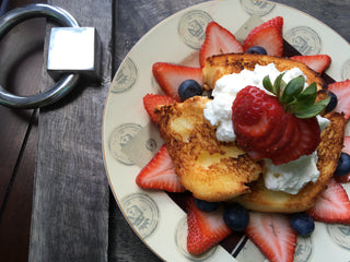 colorful plate of Broiled Angel Food Cake with Maple Whipped Cream